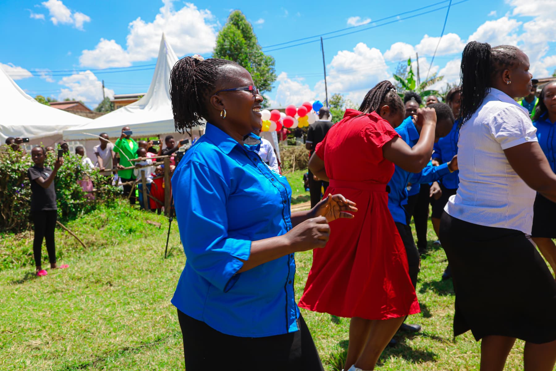 Learners and families dancing at the class of 2025 graduation celebration